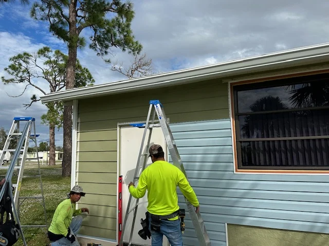 RFH crew working on a home siding installation